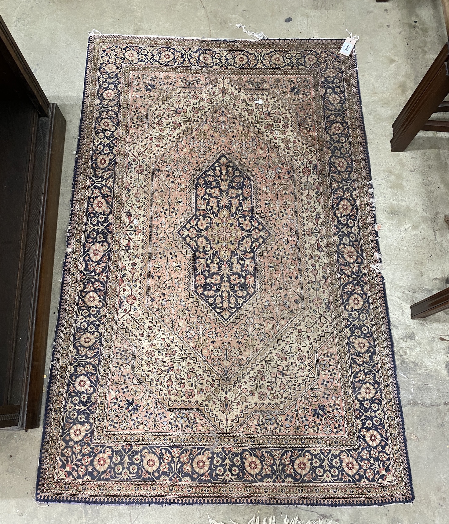 A Persian silk rug, 150 x 94cm